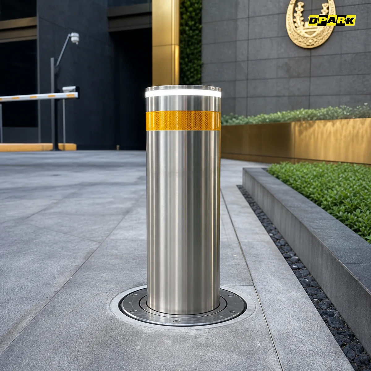เสากั้นรถ Bollard ไฮดรอลิกสแตนเลส 304 ติดตั้งที่ทางเข้าอาคาร — DPARK